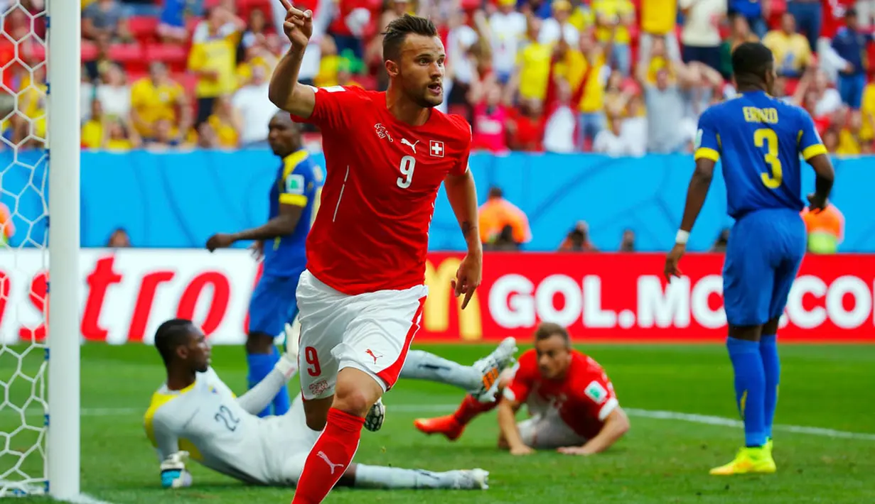 Timnas Swiss membungkam Ekuador 2-1 di penyisihan Piala Dunia 2014 Grup E di Estádio Nacional de Brasilia, (15/6/2014). (REUTERS/Paul Hanna)