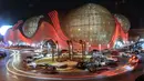 Sebuah mal menyala merah untuk menandai Hari Inklusi di Kuwait City, Kuwait, Jumat (20/7). (Stringer/Light Up For Inclusion/AFP-Services)