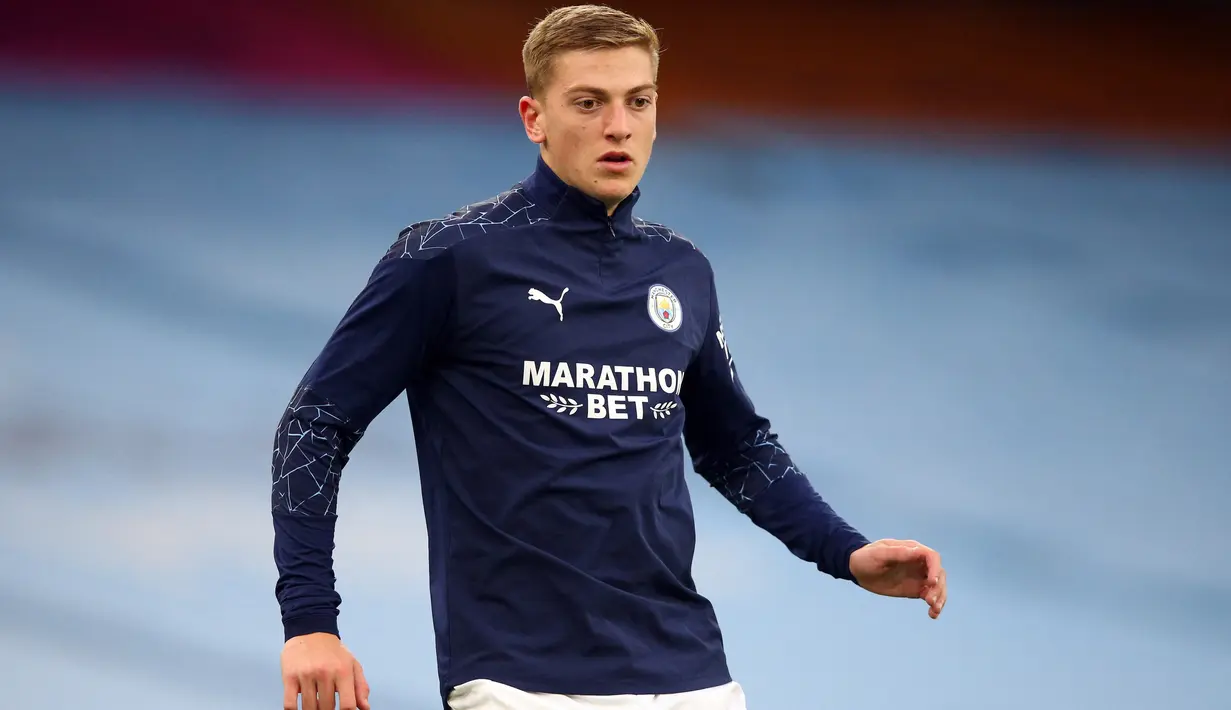 Liam Delap yang masih berusia 18 tahun ini merupakan penyerang yang lagi naik daun Manchester City U-23. Liam Delap merupakan putra dari mantan pemain Liga Inggris, Rory Delap. (AFP/Alex Livesey)