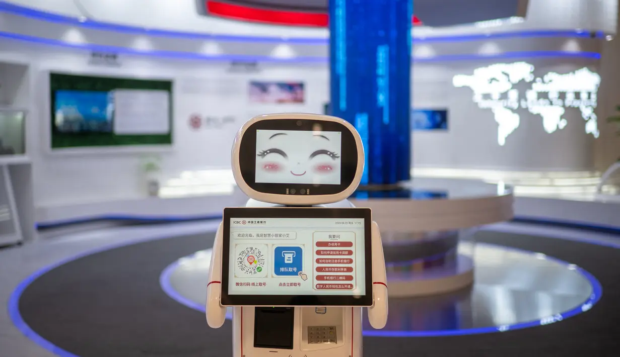 Bahkan beberapa tempat dibangun dengan bantuan robot konstruksi yang menurut penyelenggara "sangat lucu dan memiliki keahlian yang unik". (Philip FONG / AFP)