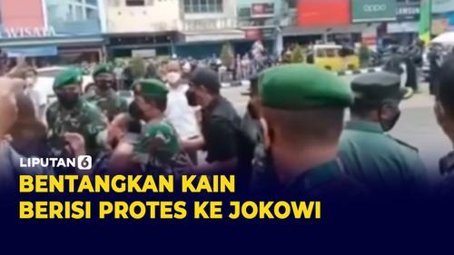 VIDEO: Berani! Warga Bentangkan Kain Protes ke Presiden Jokowi