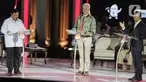 Calon Presiden-Calon Wakil Presiden nomor urut 01 Anies Baswedan (kanan) saat menyampaikan gagasan saat debat ketiga Pilpres 2024, Minggu (7/1/2024). (Liputan6.com/Faizal Fanani)