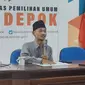 Wakil Koordinator Divisi SDM dan Organisasi, Andriansyah saat memaparkan hasil pengawasan terhadap kesiapan pelaksanaan Pemilu 2024. (Liputan6.com/Dicky Agung Prihanto)