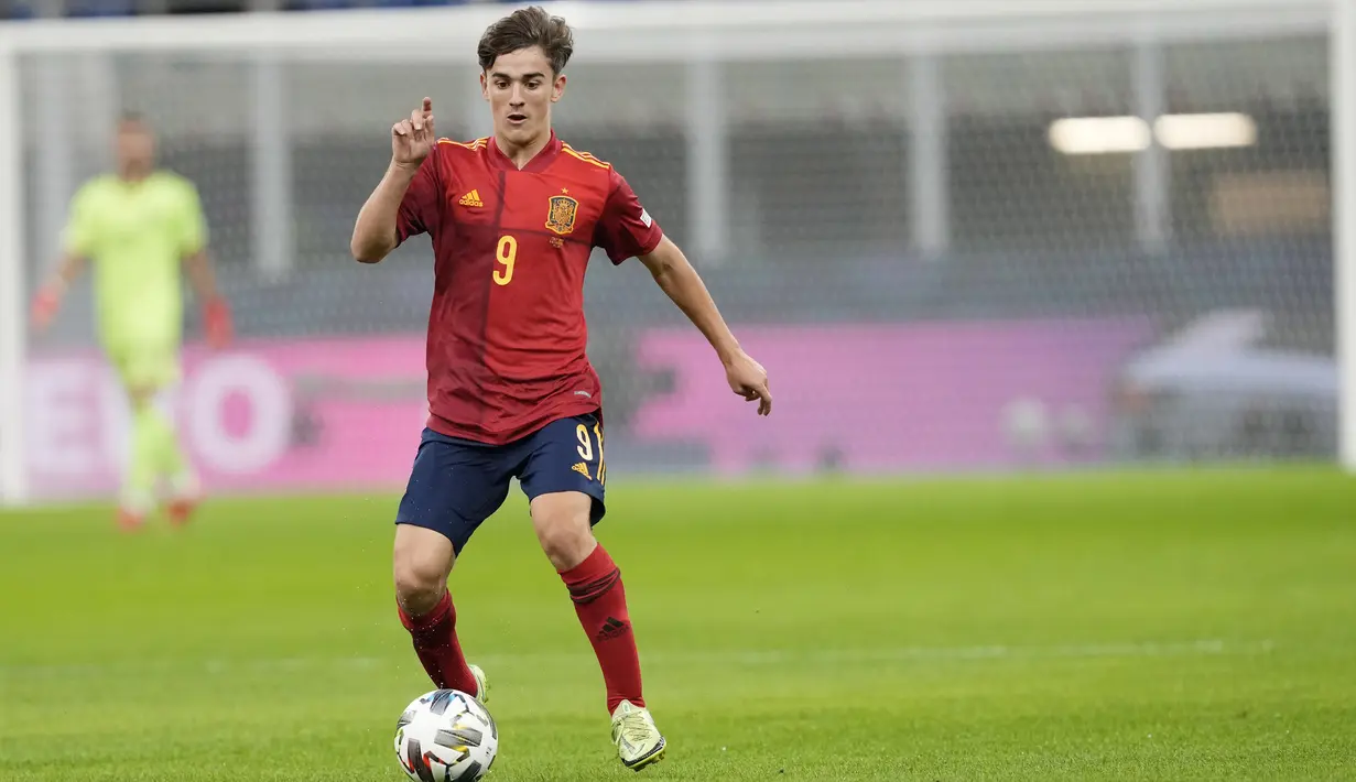Pada laga tersebut ada salah satu pemain yang mampu mencuri perhatian yakni pemain muda Spanyol, Pablo Martin Paez Gavira alias Gavi. (AP/Antonio Calanni)