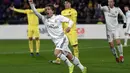 6. Ekspresi Luka Modric merayakan gol dari Lucas Vazques pada laga lanjutan LaLiga yang berlangsung di Stadion DeLa Ceramica, Spanyol, Jumat (4/12). Real Madrid ditahan imbang Villareal 2-2.  (AFP/Jose Jordan)