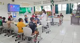 Suasana kelas tambahan di Sekolah Asrama Taruna Papua. SATP adalah sekolah berbasis asrama milik Yayasan Pemberdayaan Masyarakat Amugme dan Kamoro (YPMAK). (Foto: Liputan6.com)