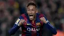 Neymar Junior saat melakukan selebrasi usai mencetak gol ke gawang Atletico Madrid dalam laga La Liga di stadion Camp Nou, Barcelona pada 11 Januari 2015. (AFP/Josep Lago)
