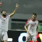 Gelandang Suriah U-23, Mouhamad Anes, melakukan selebrasi usai mencetak gol ke gawang Indonesia pada laga persahabatan di Stadion Wibawa Mukti, Cikarang, Sabtu (18/11/2017). Indonesia kalah 0-1 dari Suriah U-23. (Bola.com/ M Iqbal Ichsan)