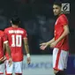 Bek Persija, M Rezaldi Hehanusa berdoa usai mencetak gol ke gawang PS TNI pada lanjutan Liga 1 Indonesia di Stadion Patriot Candrabhaga, Bekasi, Sabtu (30/9). Persija menang 4-1. (Liputan6.com/Helmi Fithriansyah)