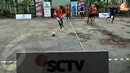 Pertandingan dua tim peserta yang mendapatkan kesempatan pertama berlaga di lapangan. (Liputan6.com/Abdul Aziz Prastowo)