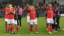 Selebrasi para pemain Benfica setelah mengalahkan Club Brugge 2-0 dalam laga leg pertama babak 16 besar Liga Champions 2022/2023 di Jan Breydel Stadium, Bruges, Belgia, Kamis (16/2/2023) dini hari WIB. (AFP/John Thys)