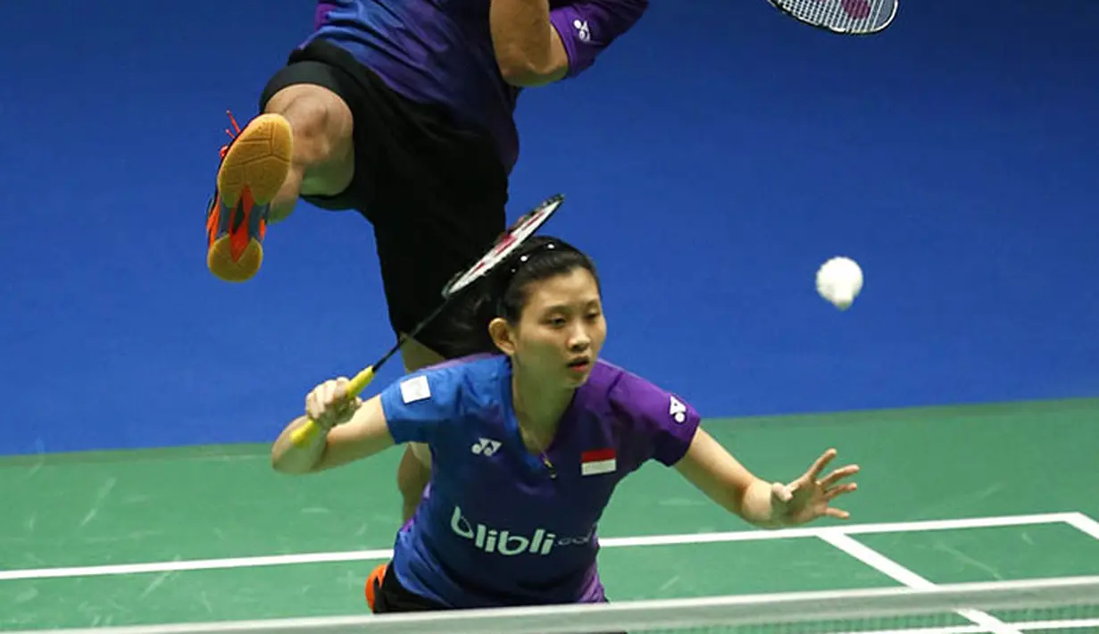 Pada babak semifinal, Praven/Debby sudah ditunggu lawan berat. Mereka harus berhadapan dengan unggulan pertama, Zhang Nan/Zhao Yunlei. (Reuters/Andrew Boyers)