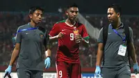 Striker Timnas Indonesia U-19, Rafli Mursalim, hanya mengalami kram saat mengalahkan Singapura dalam laga lanjutan Piala AFF U-19 2018 di Stadion Gelora Delta Sidoarjo, Selasa (3/7/2018). (Bola.com/Aditya Wany)