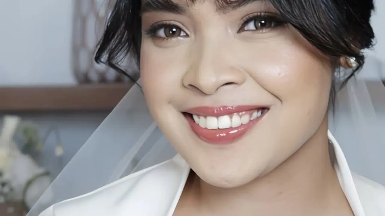 Pebulutangkis Gregoria Mariska menikah dengan Mikha Angelo