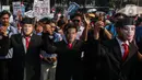 Dalam aksinya menyampaikan orasi terkait capaian pemerintahan Joko Widodo-Ma'ruf Amin. (Liputan6.com/Angga Yuniar)