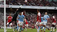 Arsenal&nbsp;menang 1-0 atas&nbsp;Manchester City pada laga pekan kedelapan Premier League di Stadion Emirates, Minggu (8/10/2023) malam WIB. Gol tunggal The Gunners disarangkan Gabriel Martinelli. (AFP/Adrian Dennis)