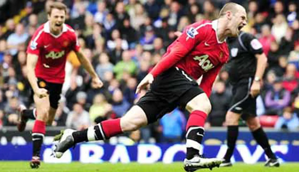 Selebrasi gol striker Manchester United Wayne Rooney ke gawang Blackburn Rovers dalam lanjutan Liga Premier, 14 Mei 2011. AFP PHOTO/GLYN KIRK