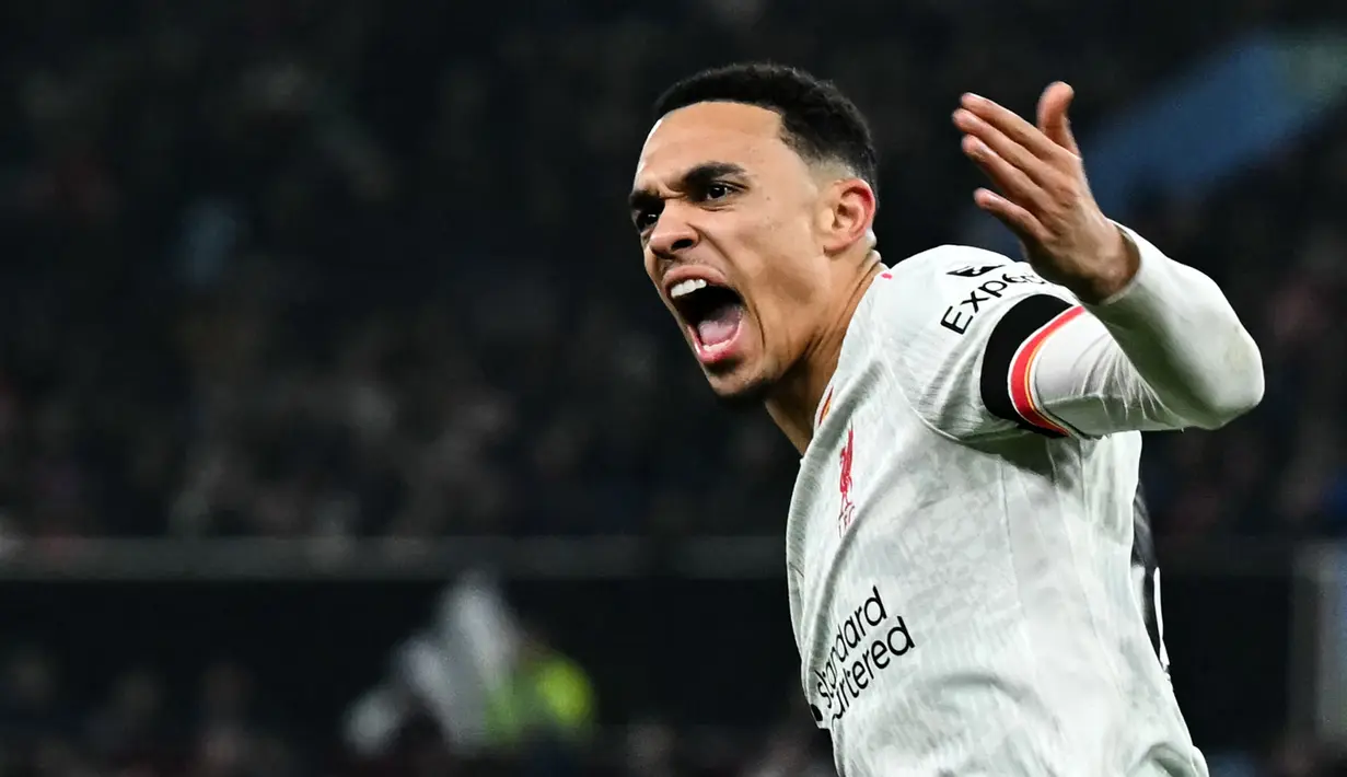 Pemain Liverpool, Trent Alexander-Arnold melakukan selebrasi setelah mencetak gol penyeimbang 2-2 ke gawang Aston Villa dalam laga lanjutan Liga Inggris 2024/2025 di Villa Park, Brimingham, Inggris, Rabu (19/02/2025) waktu setempat. (AFP/Paul Ellis)