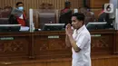 Terdakwa Richard Eliezer Pudihang Lumiu usai menjalani sidang dengan agenda pembacaan tuntutan oleh Jaksa Penuntut Umum dalam kasus pembunuhan Brigadir Yosua Hutabarat di Pengadilan Negeri Jakarta Selatan, Rabu (18/1/2023). Richard Eliezer Pudihang Lumiu di Tuntut 12 Tahun Penjara. (Liputan6.com/Johan Tallo)