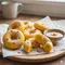 Kue Donat Labu Kuning Kukus (Image by Gemini AI)