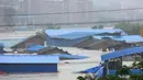 Pemandangan menunjukkan sejumlah rumah terendam banjir di Loudi, provinsi Hunan (2/7). Curah hujan yang tinggi membuat air sungai Xiangjiang meluap dan mengakibatkan banjir di provinsi Hunan. (AFP Photo/Str/China Out)