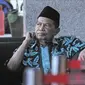 Tersangka Wali Kota Mojokerto Masud Yunus usai menjalani pemeriksaan di Gedung KPK, Jakarta, Rabu (7/2). Masud diperiksa sebagai tersangka dugaan suap pembahasan perubahah APBD pada Dinas PUPR Kota Mojokerto tahun 2017. (Liputan6.com/Herman Zakharia)