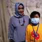 Ibu Naufal sudah mengira, ada yang tidak beres dengan anak keduanya karena badannya tidak tumbuh tinggi. (Liputan6.com/Fitri Haryanti Harsono)