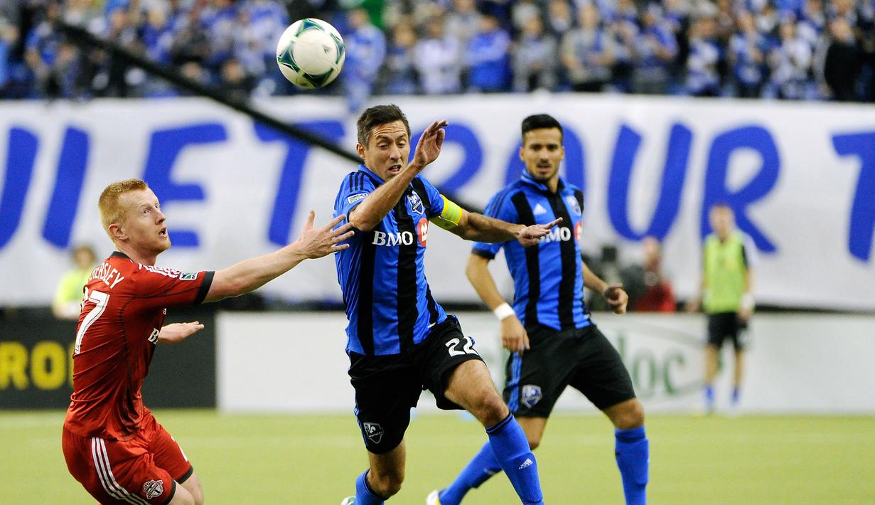 Pada 2011,Richard Eckersley (kiri) menyeberang menuju Major League Soccer demi bergabung dengan Toronto FC dan kemudian New York Red Bulls. Kariernya pun berakhir di Oldham Athletic pada 2016. (Richard Wolowicz/Getty Images/AFP)