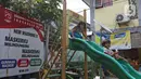 Anak-anak bermain di kawasan Petogogan, Jakarta, Selasa (2/03/2021). Data 21 Februari 2021, DKI Jakarta berhasil keluar dari zona merah Covid-19 yang dilaporkan Satuan Tugas Penanganan Covid-19 melalui covid19.go.id, pada Selasa (2/3) dan diperbarui secara mingguan. (Liputan6.com/Herman Zakharia)