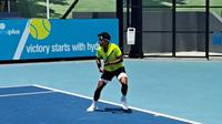 Muhamad Rifqi Fitriadi saat berjuang di seri kedua Men's World Tennis Championship 2024. (Istimewa)