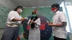 (ki-ka) Brand Manager Aice Group Sylvana Zhong, Direktur Kesiapsiagaan BNPB Eny Supartini dan Direktur Peringatan Dini BNPB Afrial Rosya berbincang pada donasi masker melalui BNPB di Jakarta, Rabu (16/9/2020). (Liputan6.com/HO/Agus)