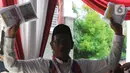 Simulasi ini juga dilakukan untuk penyederhanaan desain surat suara serta formulir pemilih dengan model baru yang akan digunakan dalam pemilu nanti. (merdeka.com/Imam Buhori)