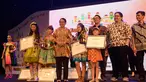 Menteri Pemberdayaan Perempuan dan Perlindungan Anak, Yohana  Yembise membacakan nominasi juara Grand Final Lomba Suara Anak Indonesia 2018 dengan tema “Anak Indonesia Menyanyi” di Theater Garuda, TMII, Jakarta, Minggu (25/11). (Liputan6.com/Pool/KPPPA)