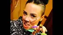Penyanyi Demi Lovato mengunggah foto dirinya yang berkostum layaknya macan saat perayaan Halloween, Jumat (31/10/2014). (instagram.com/ddlovato)