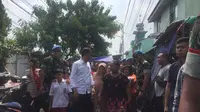 Calon presiden Joko Widodo (Jokowi) tiba di Kampung Deret Tanah Tinggi, Jakarta Pusat pada pukul 12.30 WIB.