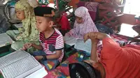 Muhammad Amin, guru mengaji difabel di Kampung Bugis, Maros, Sulsel (Liputan6.com/ Eka Hakim)