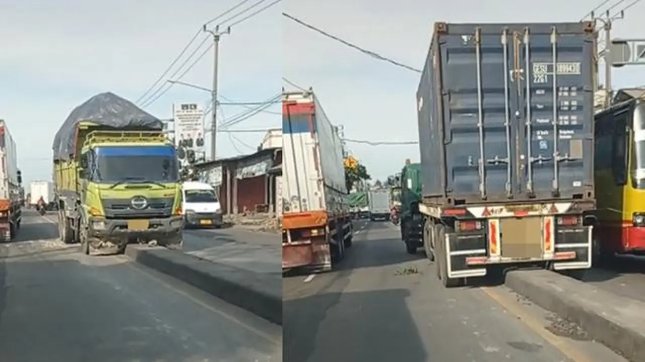 Dua truk tersangkut di pembatas jalan (TikTok/@cuka.asin)