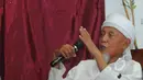 Mantan aktivis Gerakan Islam, Encep Hernawan saat menghadiri diskusi bertajuk 'ISIS dan Radikalisme' di kawasan Menteng, Jakarta, Jumat (20/3/2015). (Liputan6.com/Herman Zakharia)
