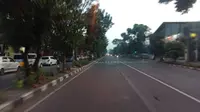 Suasana jalanan Kota Bandung lengang pada hari pertama Lebaran. (Huyogo Simbolon)