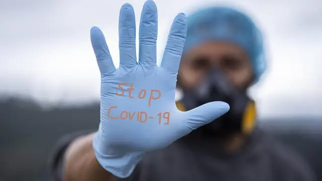 Ilustrasi Stop Covid-19 (Liputan6.com/Arfandi Ibrahim)