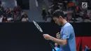 Pebulutangkis tunggal putera Indonesia, Jonatan Christie usai melawan Son Wan Ho (Korea) pada babak pertama turnamen Indonesia Masters 2018 di Istora Senayan, Jakarta, Rabu (24/1). Jonatan kalah 15-21, 10-21. (Liputan6.com/Helmi Fithriansyah)