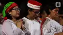 Karyawan EMTEK Group beragama Nasrani menghadiri Perayaan Natal Persekutuan Doa SCTB - Emtek Group 2019 di Studio 6 Emtek City, Jakarta, Kamis (19/12/2019). Acara yang juga diisi Agnez Mo Christmas Concert – The Greatest Love ini akan disiarkan pada 24 Desember di SCTV. (Liputan6.com/Johan Tallo)