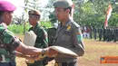 Citizen6, Pasuruan: Wadan Kobangdikal Brigjen TNI Marinir P. Verry Kunto membuka TNI Manunggal Membangun Desa (TMMD) ke-88 2012 di lapangan Pancasila Desa Krajan Wetan Kecamatan Puspo, Pasuruan, Rabu (23/5). (Pengirim: Penkobangdikal)