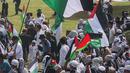 Terdengar peserta aksi meneriakkan kemerdekaan Palestina yang saat ini tengah dijajah Israel. (Liputan6.com/Angga Yuniar)