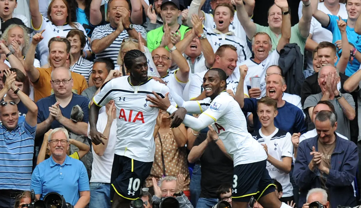 <p>Emmanuel Adebayor. Striker asal Togo yang telah pensiun pada Juli 2010 bersama Olimpia Asuncion di Liga Paraguay ini pernah berseragam Tottenham Hotspur selama 4 musim mulai 2011/2012 hingga 2014/2015 usai didatangkan dari Manchester City. Bersama The Lilywhites, ia total tampil dalam 113 laga di semua ajang dengan torehan 42 gol dan 20 assist. (AFP/Olly Greenwood)</p>