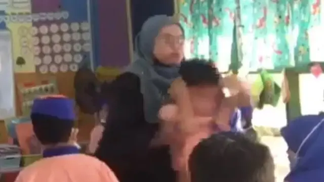 viral video guru lempar murid