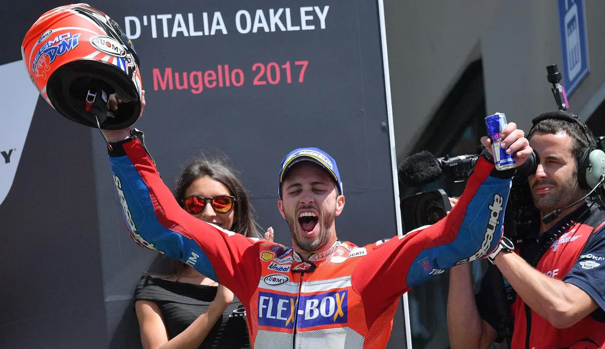 Pebalap Ducati, Andrea Dovizioso, berhasil menjuarai balapan MotoGP Italia di Sirkuit Mugello, Minggu (4/6/2017). Dovizioso menang dengan catatan waktu 41 menit 32,126 detik. (EPA/Luca Zennaro)