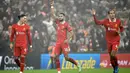 Pemain Liverpool, Cody Gakpo (tengah) melakukan selebrasi setelah mencetak gol duel Boxing Day Premier League 2024/2025 melawan Leicester City di stadion Anfield pada 26 Desember 2024 waktu setempat atau Jumat 27 Desember 2024 dini hari WIB. (Paul ELLIS/AFP)