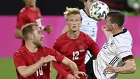 Jeman melakoni pertandingan uji coba pertamanya menjelang Euro 2020 (Euro 2021) di Tivoli Stadium Tirol, Innsbruck, Austria, Kamis (3/6/2021). Sayangnya mereka hanya mendapatkan hasil seri (1-1) melawan Denmark. (Foto: AP/Pool/Frederico Gambarini)