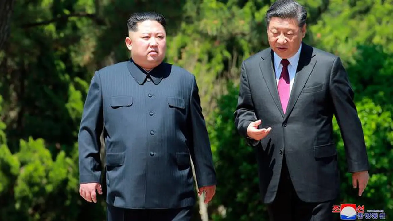 Xi Jinping dan Kim Jong-un
